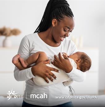 Mother holding infant lovingly